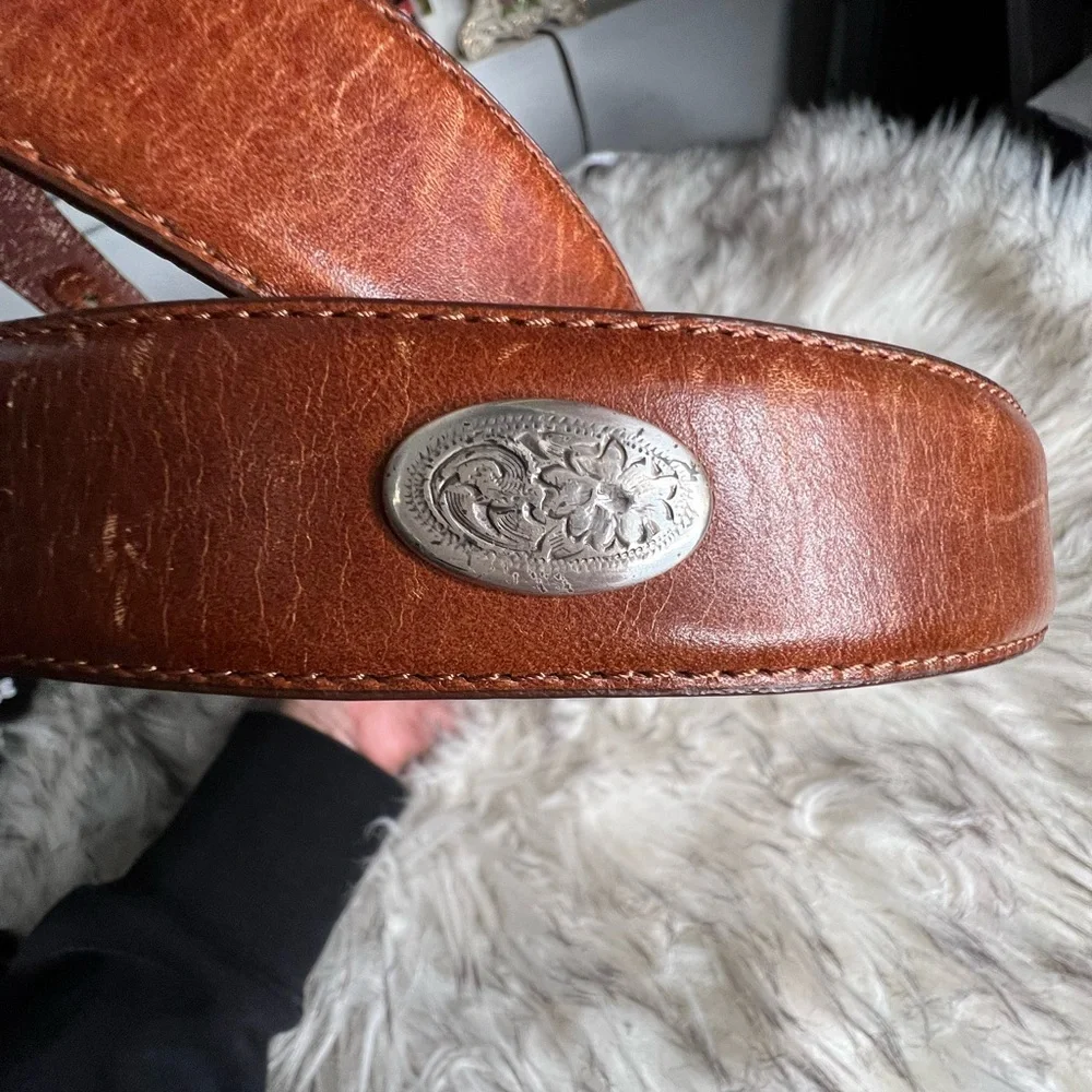 Nocona brown leather belt and ornate silver belt buckle